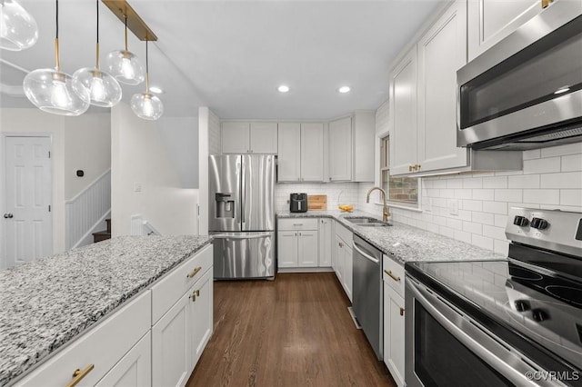 1101 Clearlake Rd, Chesterfield, VA 23236 - kitchen with stainless steel appliances, white cabinetry, dark wood-style flooring, backsplash, and recessed lighting