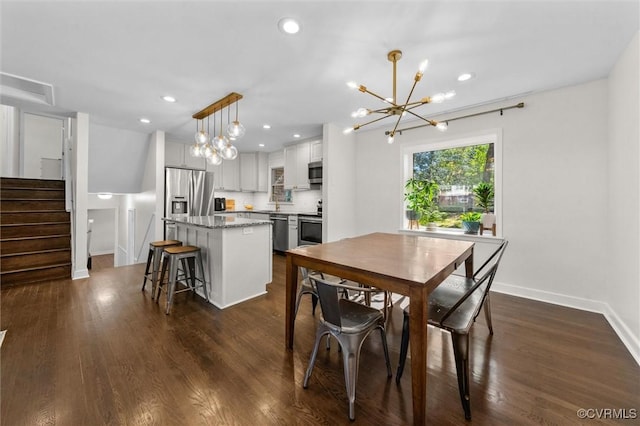 1101 Clearlake Rd, Chesterfield, VA 23236 - dining space with a chandelier, dark wood-style floors, recessed lighting, and stairway