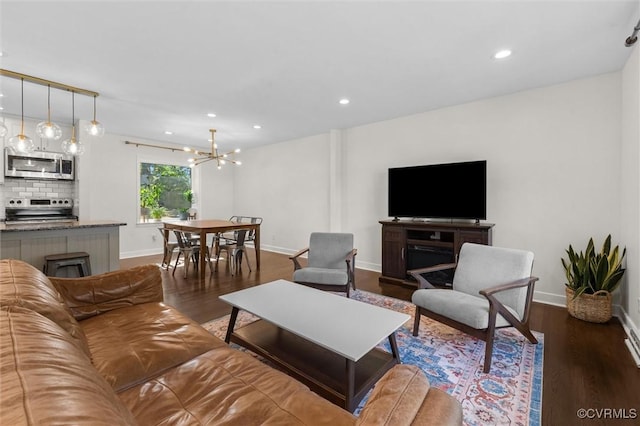 1101 Clearlake Rd, Chesterfield, VA 23236 - living area featuring dark wood finished floors, a chandelier, and recessed lighting