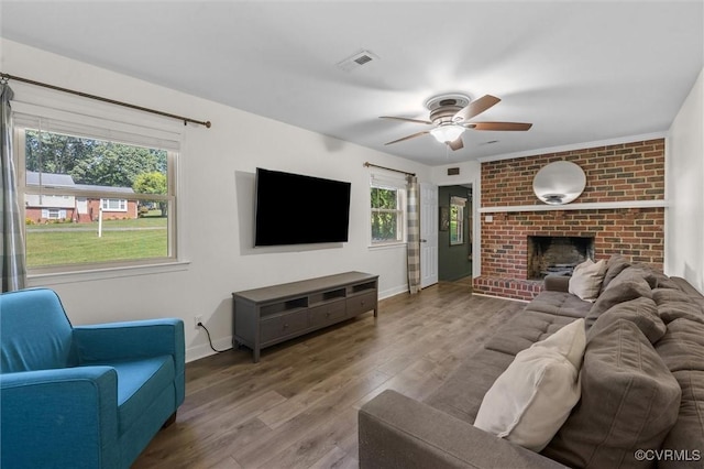 1101 Clearlake Rd, Chesterfield, VA 23236 - living room with wood finished floors, ceiling fan, and a fireplace