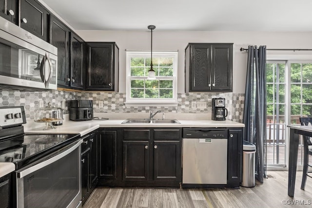 225 Scotch Pine Dr, Sandston, VA 23150 - kitchen featuring stainless steel appliances, dark cabinets, and healthy amount of natural light