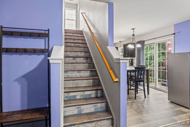 225 Scotch Pine Dr, Sandston, VA 23150 - staircase featuring wood finished floors and a chandelier