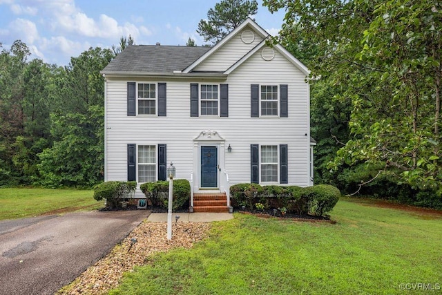 225 Scotch Pine Dr, Sandston, VA 23150 - view of front of house featuring a front yard and roof with shingles