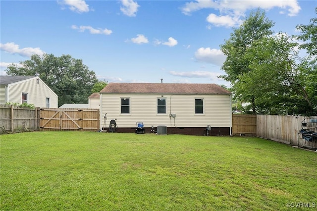 1403 Miles Ave, Hopewell, VA 23860 - back of property featuring a gate, crawl space, and a fenced backyard