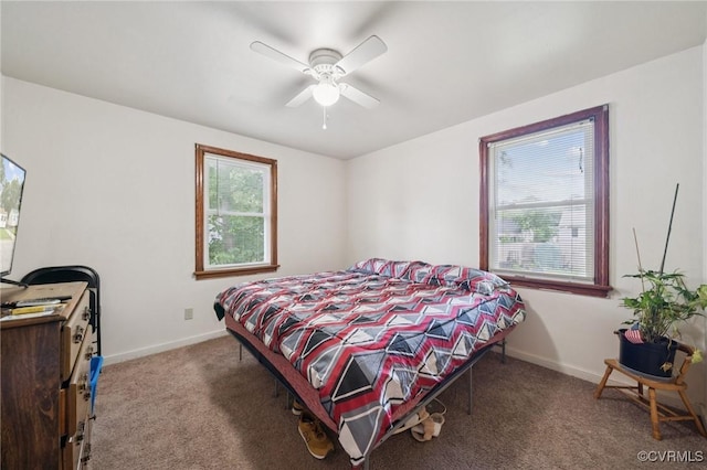 1403 Miles Ave, Hopewell, VA 23860 - carpeted bedroom featuring baseboards and ceiling fan