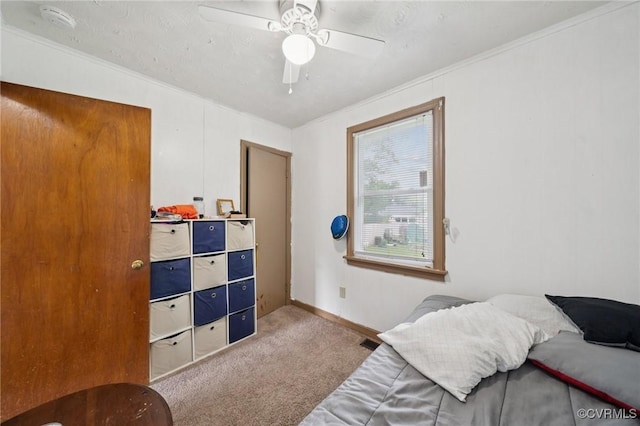 1403 Miles Ave, Hopewell, VA 23860 - carpeted bedroom featuring a ceiling fan and ornamental molding
