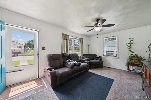 1403 Miles Ave, Hopewell, VA 23860 - carpeted living room with healthy amount of natural light, a ceiling fan, and cooling unit