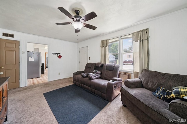 1403 Miles Ave, Hopewell, VA 23860 - living room with light colored carpet and a ceiling fan