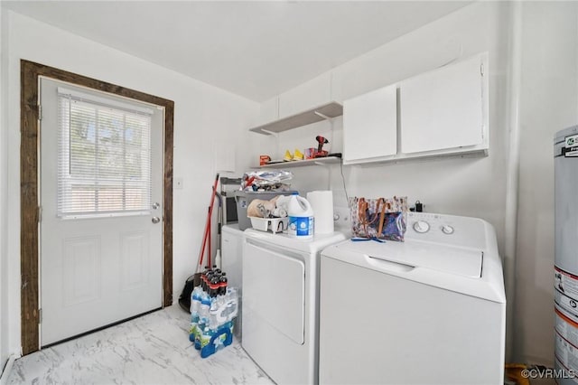 1403 Miles Ave, Hopewell, VA 23860 - laundry area featuring independent washer and dryer, cabinet space, and light marble finish floors