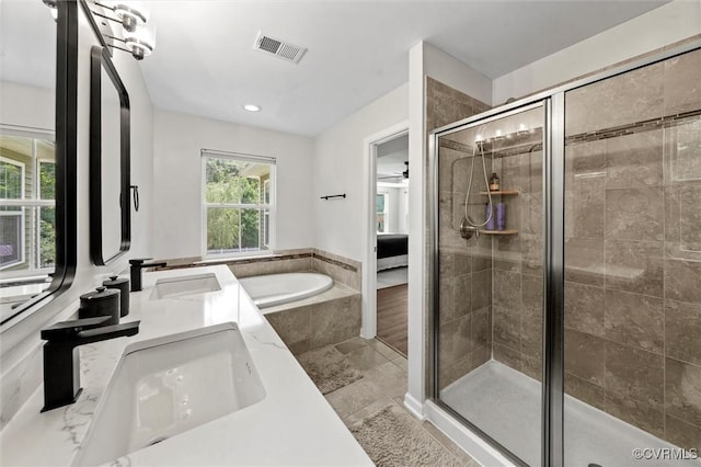 3057 Hunton Cottage Ln, Glen Allen, VA 23059 - bathroom with a garden tub, a shower stall, double vanity, recessed lighting, and ensuite bath