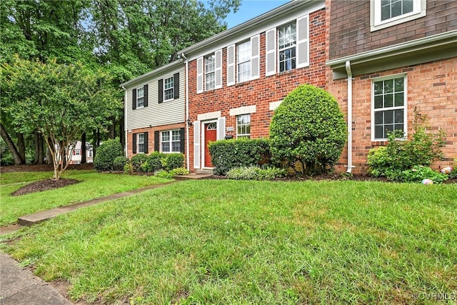1593 Constitution Dr, Henrico, VA 23238 - colonial home with brick siding and a front lawn