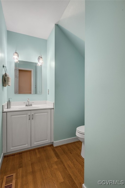 1406 Walton Bluff Ter, Midlothian, VA 23114 - bathroom featuring wood finished floors and vanity