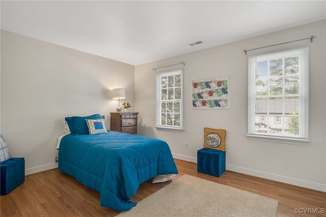 1406 Walton Bluff Ter, Midlothian, VA 23114 - bedroom featuring baseboards and wood finished floors
