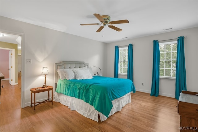 1406 Walton Bluff Ter, Midlothian, VA 23114 - bedroom with wood finished floors and a ceiling fan