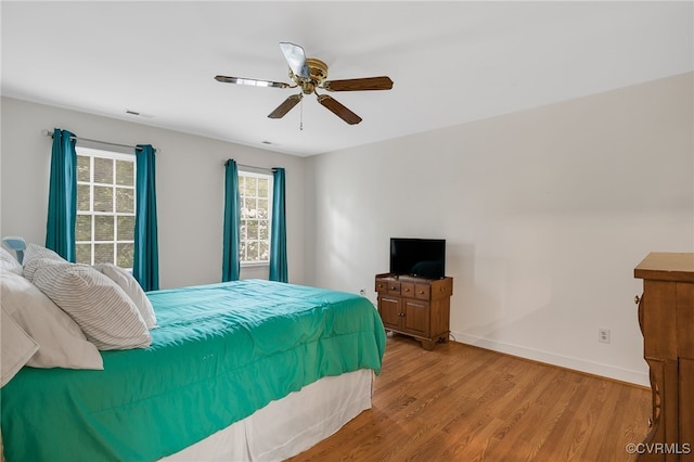 1406 Walton Bluff Ter, Midlothian, VA 23114 - bedroom with light wood-style flooring and ceiling fan