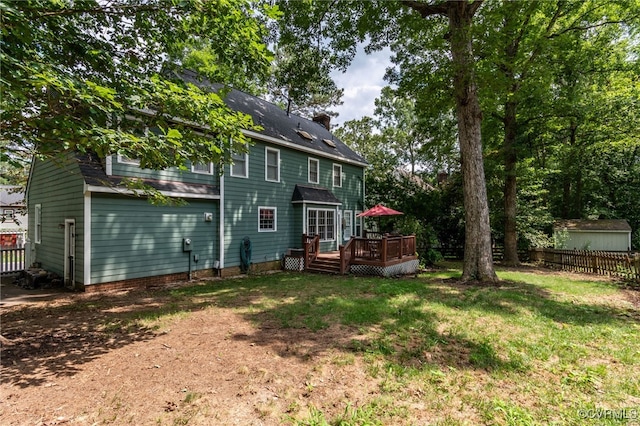 1406 Walton Bluff Ter, Midlothian, VA 23114 - back of property with a deck and a chimney