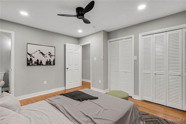4712 Kyloe Ln, Moseley, VA 23120 - bedroom featuring multiple closets, light wood finished floors, recessed lighting, ensuite bathroom, and a ceiling fan
