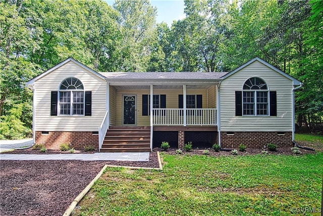 6434 Anderson Hwy, Powhatan, VA 23139 - view of front of home with crawl space, covered porch, and a front lawn