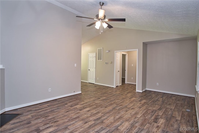 6434 Anderson Hwy, Powhatan, VA 23139 - empty room featuring a ceiling fan, dark wood-style floors, vaulted ceiling, and a textured ceiling