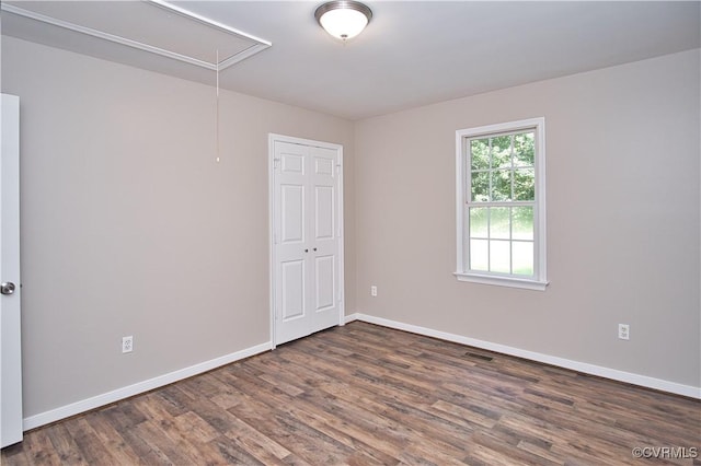 6434 Anderson Hwy, Powhatan, VA 23139 - spare room with attic access and wood finished floors