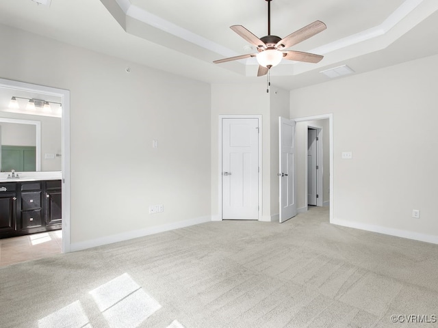 341 Crofton Village Ter Unit Kd, Chesterfield, VA 23114 - unfurnished bedroom with light carpet, ensuite bath, and a tray ceiling