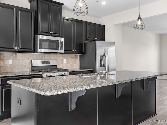 341 Crofton Village Ter Unit Kd, Chesterfield, VA 23114 - kitchen featuring appliances with stainless steel finishes, dark cabinets, and backsplash