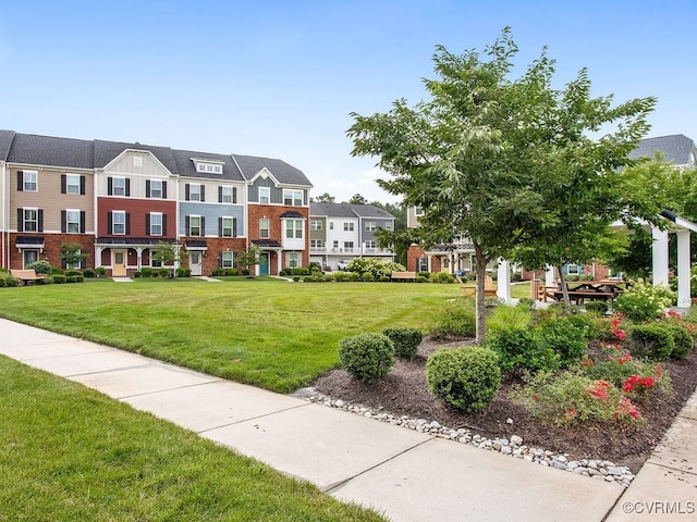341 Crofton Village Ter Unit Kd, Chesterfield, VA 23114 - view of front facade featuring a front yard and brick siding