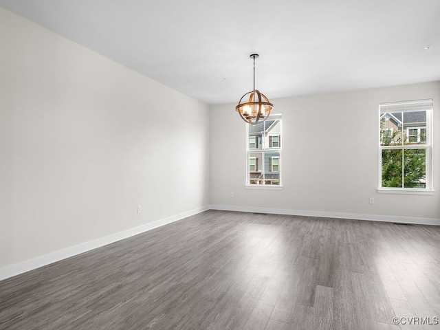 341 Crofton Village Ter Unit Kd, Chesterfield, VA 23114 - empty room with dark wood-style flooring and a chandelier