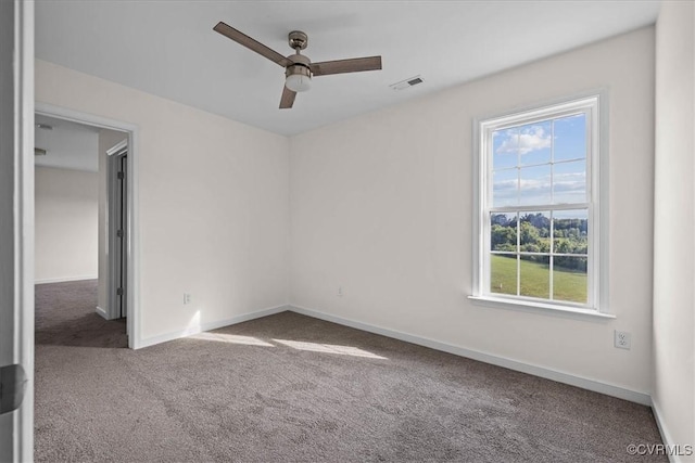 11325 Webb Rd, Disputanta, VA 23842 - spare room with carpet floors and a ceiling fan