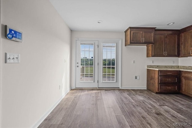 11325 Webb Rd, Disputanta, VA 23842 - kitchen featuring wood finished floors, dark brown cabinetry, and recessed lighting