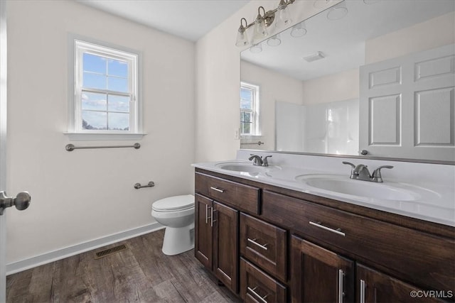 11325 Webb Rd, Disputanta, VA 23842 - full bath with double vanity and wood finished floors