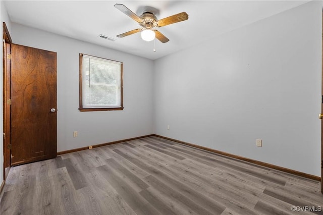 11900 James River Dr, North Prince George, VA 23860 - unfurnished bedroom with wood finished floors and ceiling fan