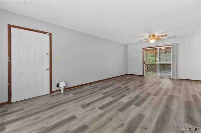 11900 James River Dr, North Prince George, VA 23860 - spare room featuring wood finished floors and ceiling fan