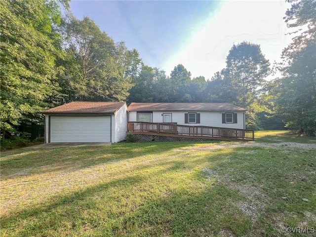 11900 James River Dr, North Prince George, VA 23860 - view of front of property with an outbuilding, a garage, a wooden deck, and a front yard