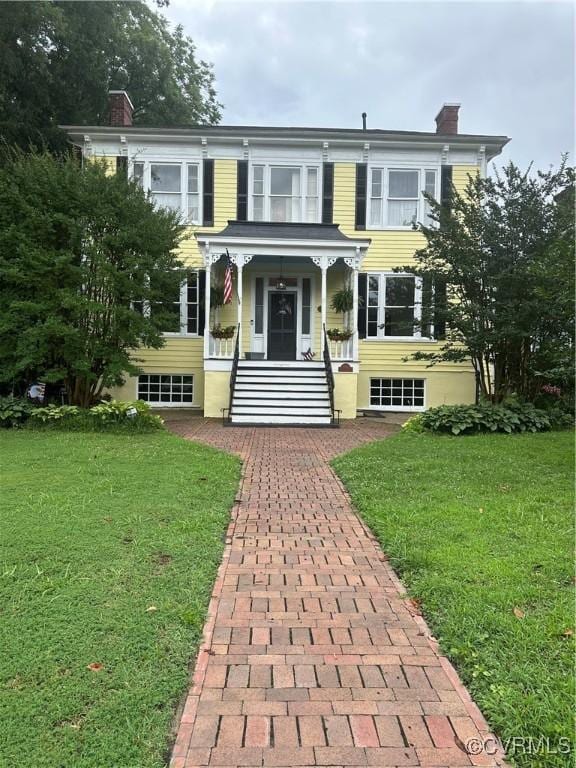 544 High St, Petersburg, VA 23803 - italianate house featuring a chimney and a front lawn