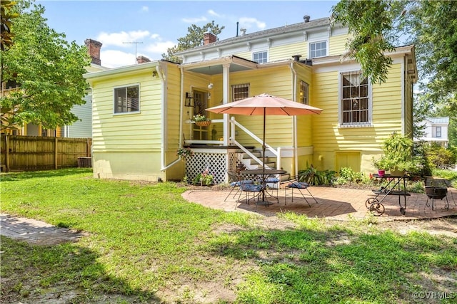 544 High St, Petersburg, VA 23803 - back of property featuring a patio