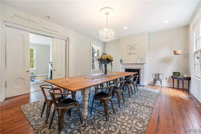 544 High St, Petersburg, VA 23803 - dining area with hardwood / wood-style flooring, a chandelier, a fireplace, and recessed lighting