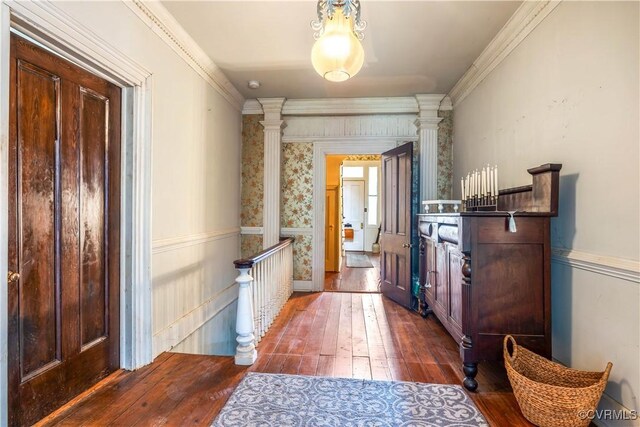 544 High St, Petersburg, VA 23803 - entrance foyer featuring dark wood-type flooring, ornate columns, and crown molding