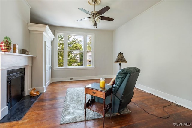 544 High St, Petersburg, VA 23803 - sitting room with a high end fireplace, ceiling fan, and hardwood / wood-style flooring