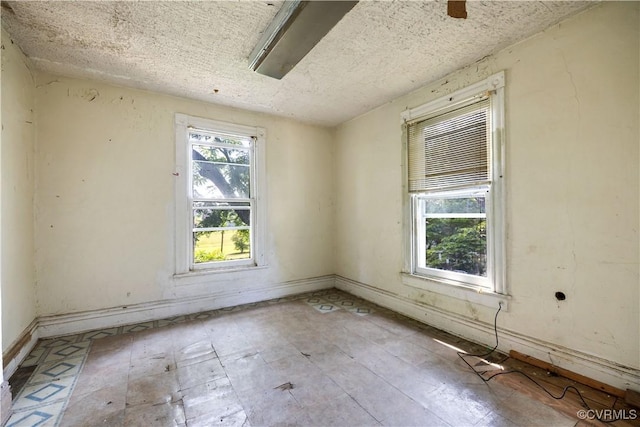 415 W 24th St, Richmond, VA 23225 - spare room with a textured ceiling