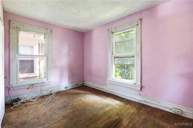 415 W 24th St, Richmond, VA 23225 - spare room featuring wood-type flooring and baseboards