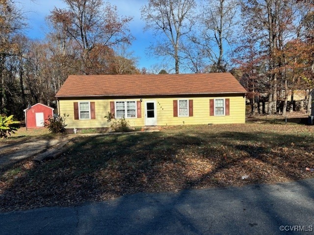 5354 Thornington Dr, North Chesterfield, VA 23237 - ranch-style home with a storage unit and a front lawn