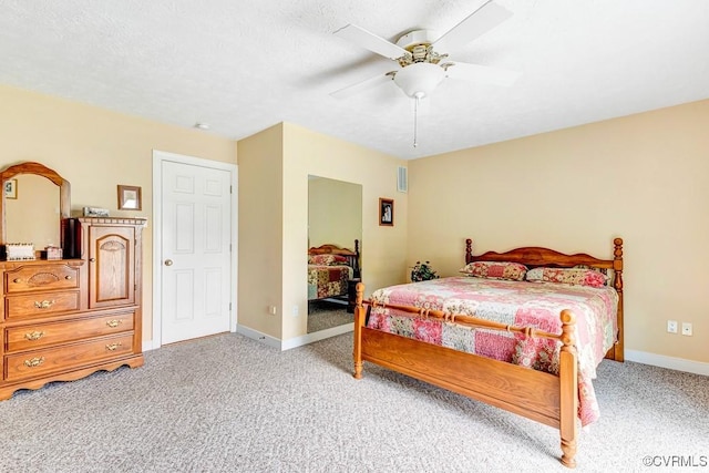 1382 Glebe Landing Rd, Center Cross, VA 22437 - bedroom with light colored carpet and a ceiling fan