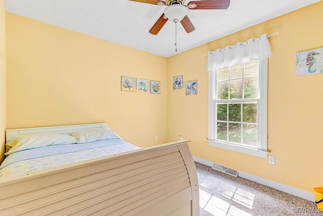 1382 Glebe Landing Rd, Center Cross, VA 22437 - bedroom featuring carpet flooring and a ceiling fan