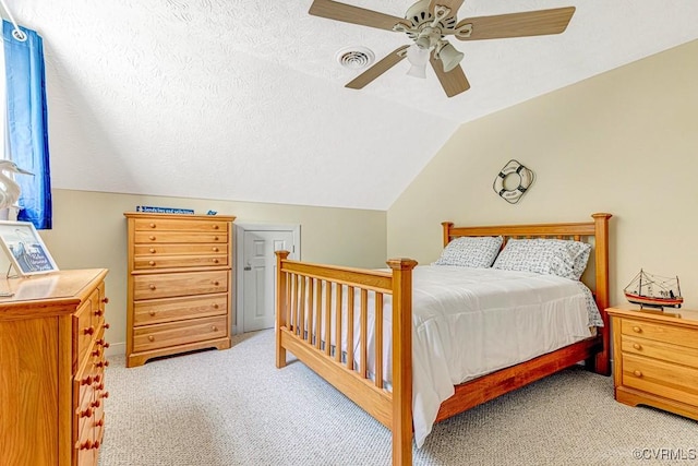 1382 Glebe Landing Rd, Center Cross, VA 22437 - bedroom featuring light carpet, vaulted ceiling, and a ceiling fan