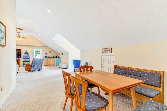 1382 Glebe Landing Rd, Center Cross, VA 22437 - dining area with lofted ceiling, a ceiling fan, carpet flooring, and a textured ceiling