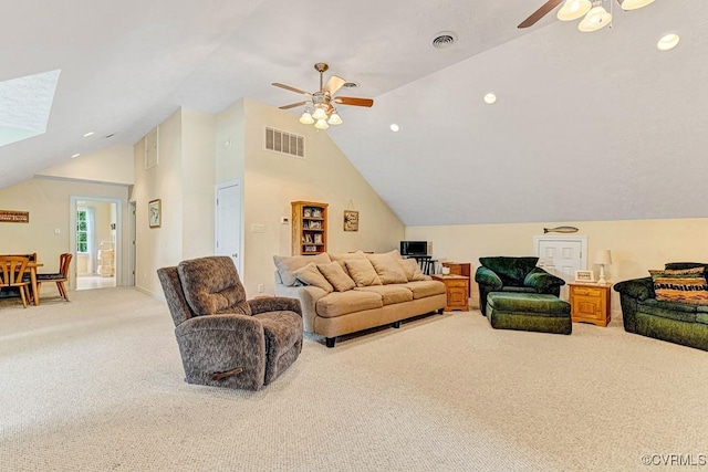 1382 Glebe Landing Rd, Center Cross, VA 22437 - living area with a ceiling fan, light carpet, vaulted ceiling, a skylight, and recessed lighting