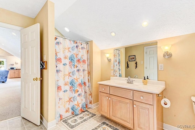 1382 Glebe Landing Rd, Center Cross, VA 22437 - full bath with vaulted ceiling, vanity, a shower with curtain, tile patterned flooring, and a textured ceiling