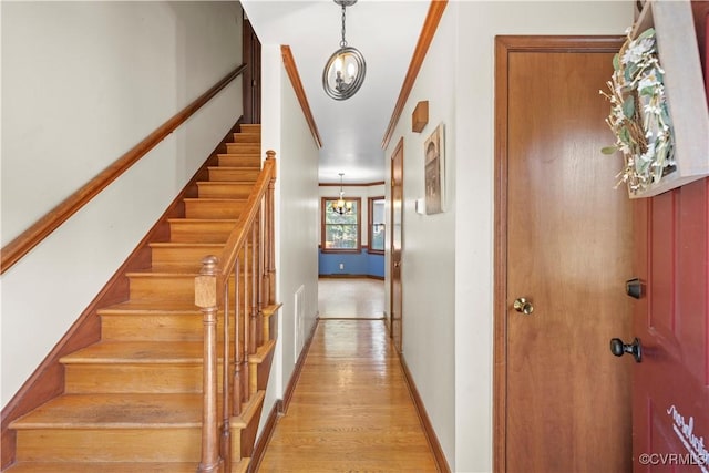 11906 Exbury Ter, Midlothian, VA 23114 - staircase featuring a chandelier and wood finished floors