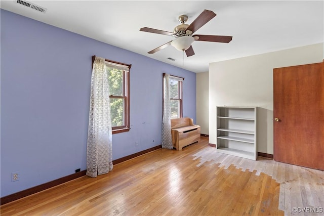 11906 Exbury Ter, Midlothian, VA 23114 - unfurnished bedroom with light wood-style flooring and ceiling fan